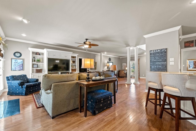 3305 Seminole Trl, Sherwood, AR 72120 - living room with ornate columns, crown molding, a ceiling fan, light wood-style flooring, and recessed lighting
