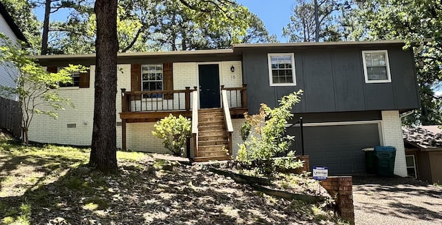 15 Flourite Ct, Little Rock, AR 72212 - view of front of home with brick siding, driveway, and a garage