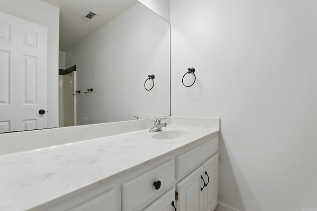 19 Twin Lks, Cabot, AR 72023 - bathroom featuring vanity, a shower, and baseboards