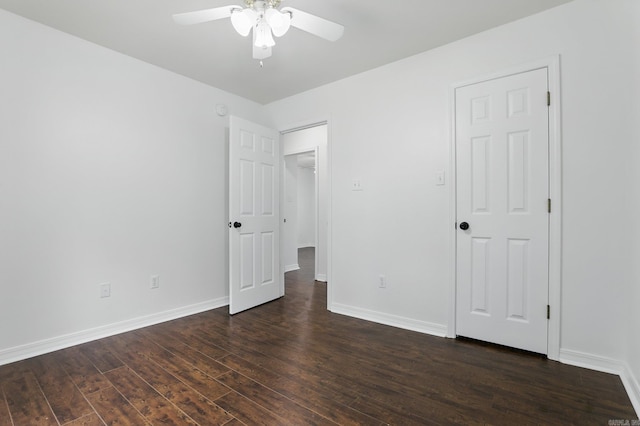 19 Twin Lks, Cabot, AR 72023 - unfurnished bedroom with dark wood-type flooring, baseboards, and ceiling fan