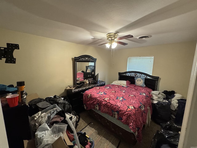 bedroom with carpet floors and a ceiling fan