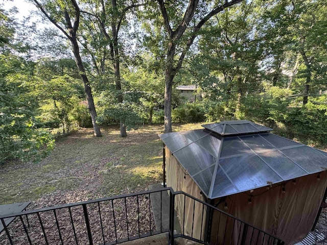 view of yard with a wooded view