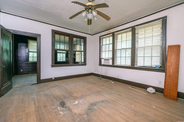 2815 Broadway St, Little Rock, AR 72206 - spare room featuring wood finished floors, a ceiling fan, and baseboards