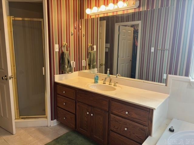 115 Las Colinas St, Conway, AR 72034 - full bathroom with wallpapered walls, a shower stall, tile patterned floors, vanity, and a bath