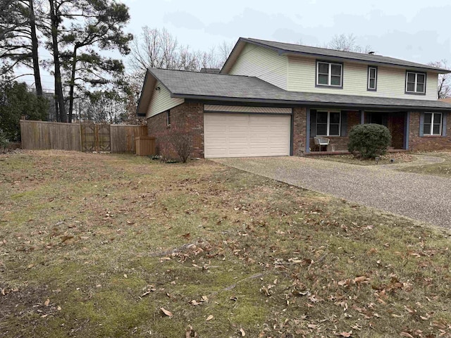 view of front of home with an attached garage, gravel driveway, brick siding, and covered porch