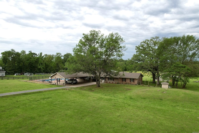 6873 Brazil Rd, Benton, AR 72019 - view of yard with a detached carport and driveway
