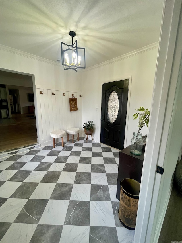 6873 Brazil Rd, Benton, AR 72019 - entryway featuring crown molding and a chandelier