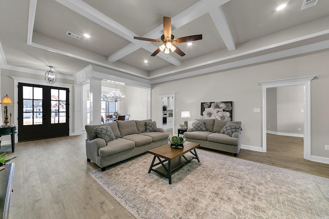 50 Wellington Pl, Cabot, AR 72023 - living area featuring a chandelier, french doors, wood finished floors, ceiling fan, and beamed ceiling