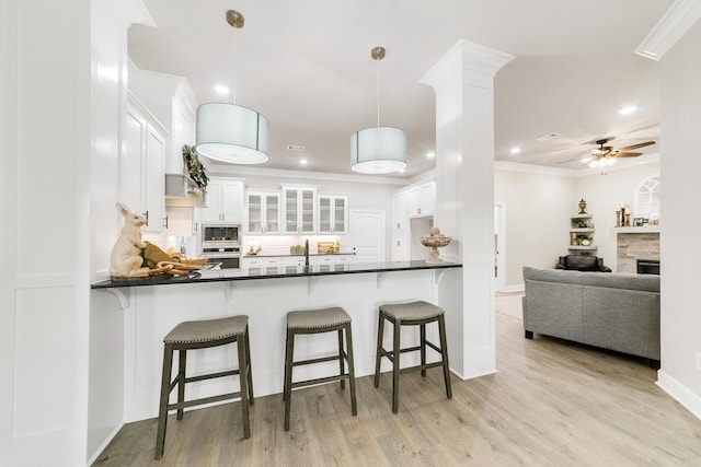 50 Wellington Pl, Cabot, AR 72023 - kitchen with dark countertops, white cabinets, stainless steel appliances, a sink, and recessed lighting