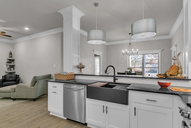 50 Wellington Pl, Cabot, AR 72023 - kitchen featuring stainless steel dishwasher, a sink, dark stone countertops, open floor plan, and white cabinets