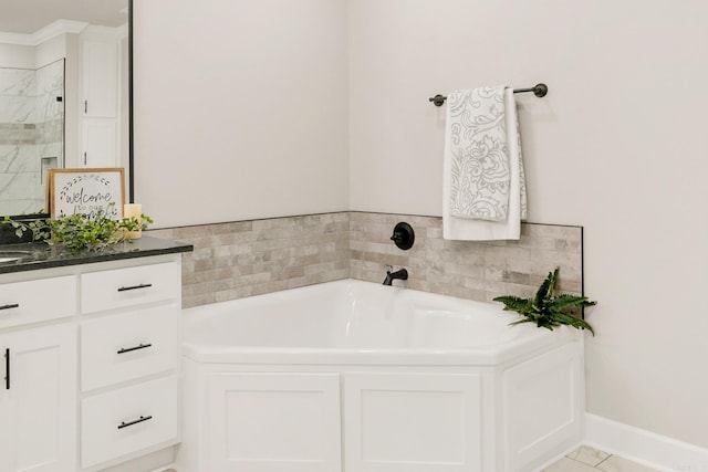 50 Wellington Pl, Cabot, AR 72023 - bathroom with a garden tub, vanity, and a shower stall