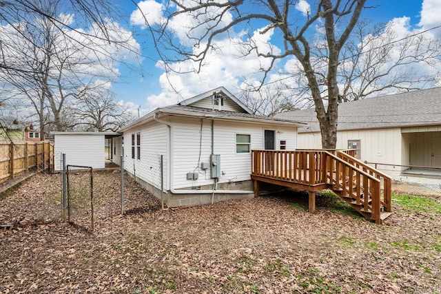 3317 W 7th St, Little Rock, AR 72205 - rear view of property with a wooden deck and an outbuilding