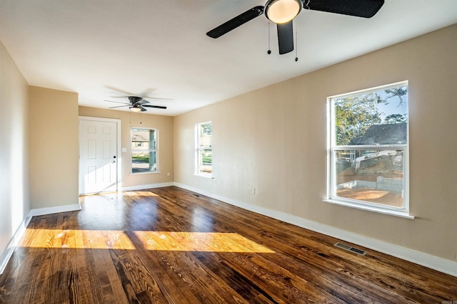 3317 W 7th St, Little Rock, AR 72205 - empty room with a ceiling fan, wood finished floors, healthy amount of natural light, and baseboards