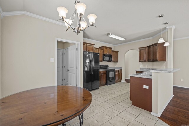4114 Valles Rd, North Little Rock, AR 72118 - kitchen with black appliances, arched walkways, a chandelier, a peninsula, and ornamental molding