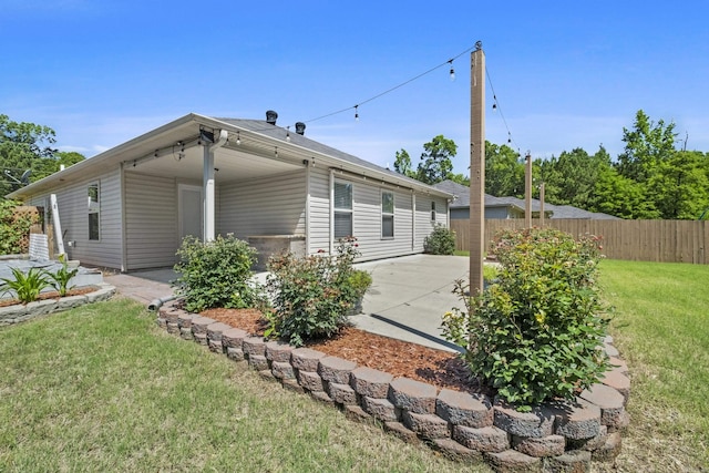 4114 Valles Rd, North Little Rock, AR 72118 - rear view of house with a patio area