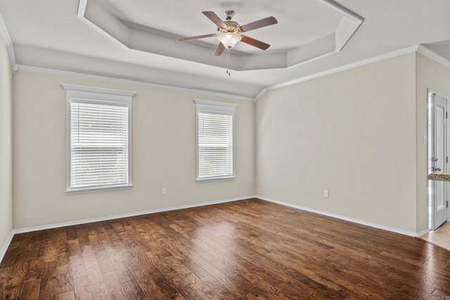 4114 Valles Rd, North Little Rock, AR 72118 - unfurnished room featuring a raised ceiling, ceiling fan, wood finished floors, ornamental molding, and baseboards