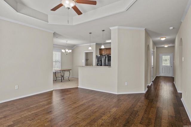 4114 Valles Rd, North Little Rock, AR 72118 - unfurnished living room featuring a ceiling fan, dark wood-style flooring, ornamental molding, a chandelier, and baseboards