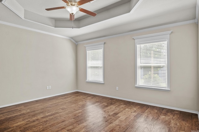 4114 Valles Rd, North Little Rock, AR 72118 - spare room featuring wood finished floors, a ceiling fan, a tray ceiling, baseboards, and crown molding