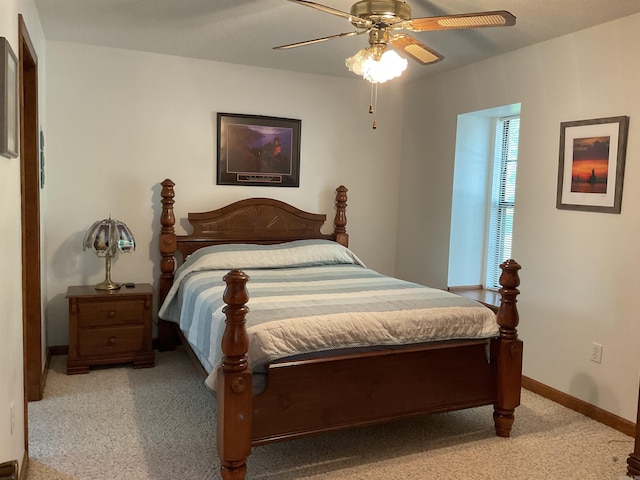 235 Sylvan Dr, Greers Ferry, AR 72067 - bedroom featuring carpet floors, baseboards, and ceiling fan