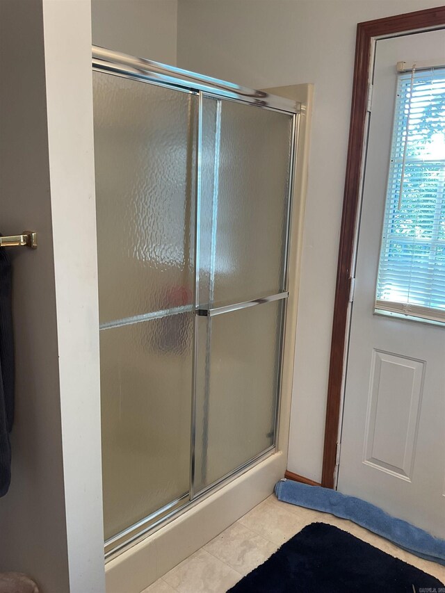 235 Sylvan Dr, Greers Ferry, AR 72067 - full bath featuring an enclosed shower and tile patterned flooring