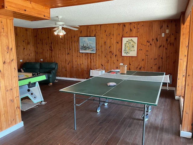 235 Sylvan Dr, Greers Ferry, AR 72067 - recreation room featuring ceiling fan, wood finished floors, a textured ceiling, baseboards, and wooden walls