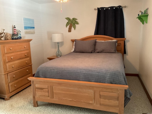 235 Sylvan Dr, Greers Ferry, AR 72067 - bedroom featuring light carpet and baseboards