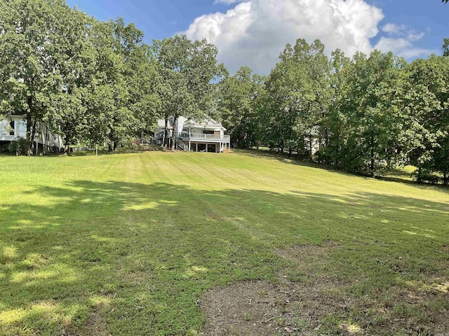 235 Sylvan Dr, Greers Ferry, AR 72067 - view of green lawn with view of scattered trees