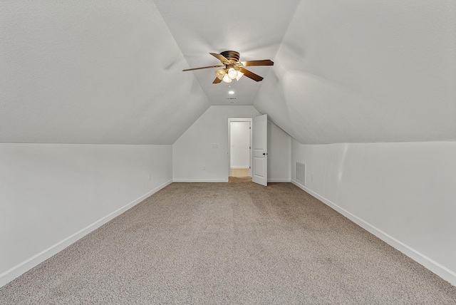 2207 Byrnewood, Jonesboro, AR 72404 - bonus room featuring carpet floors, vaulted ceiling, baseboards, and ceiling fan