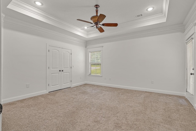 2207 Byrnewood, Jonesboro, AR 72404 - unfurnished bedroom featuring a raised ceiling, light colored carpet, ornamental molding, baseboards, and recessed lighting