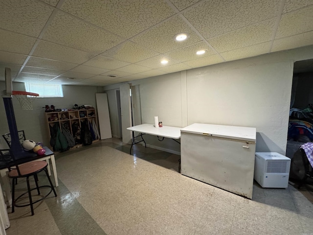 821 S 12th Ave, Piggott, AR 72454 - basement featuring tile patterned floors, a paneled ceiling, and recessed lighting