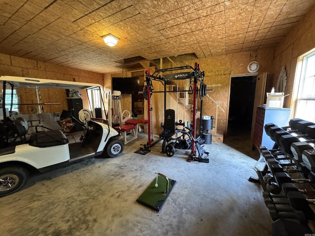 821 S 12th Ave, Piggott, AR 72454 - exercise room with a garage