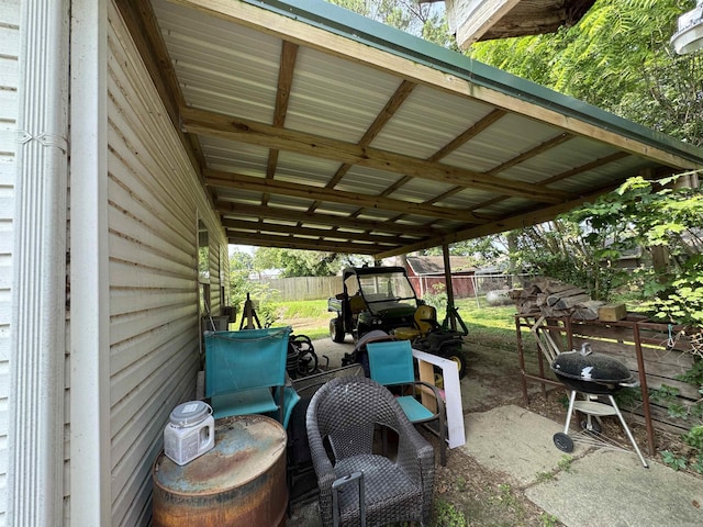 821 S 12th Ave, Piggott, AR 72454 - fenced backyard featuring grilling area