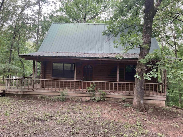 1602 Lake Clf, Higden, AR 72067 - view of front of home with a porch and metal roof