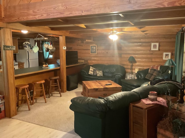 1602 Lake Clf, Higden, AR 72067 - living room featuring a ceiling fan, wood finished floors, and a bar