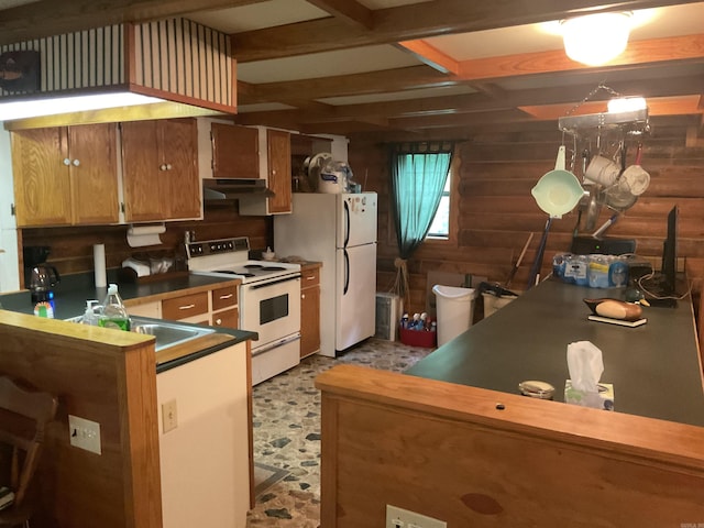 1602 Lake Clf, Higden, AR 72067 - kitchen with white appliances, under cabinet range hood, rustic walls, a sink, and dark countertops