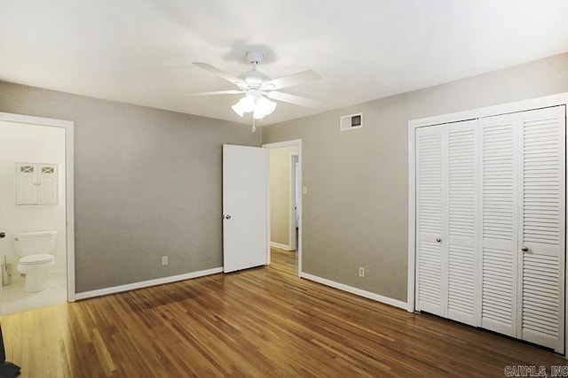 5 Brookridge Dr, Little Rock, AR 72205 - unfurnished bedroom with wood finished floors, baseboards, a closet, ensuite bath, and ceiling fan