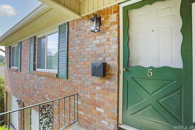 5 Brookridge Dr, Little Rock, AR 72205 - entrance to property featuring brick siding and board and batten siding