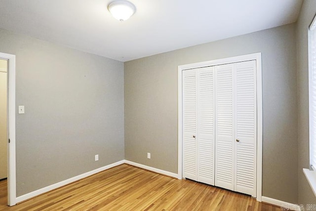 5 Brookridge Dr, Little Rock, AR 72205 - unfurnished bedroom featuring light wood-style flooring, a closet, and baseboards