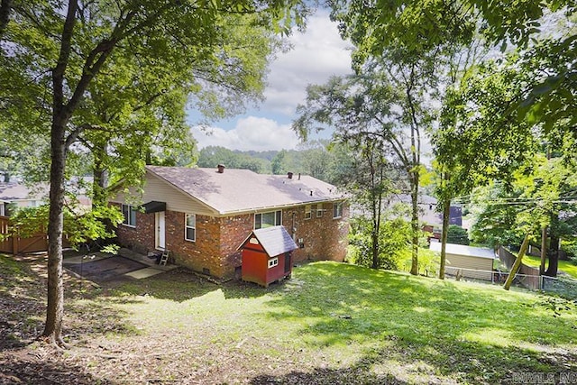5 Brookridge Dr, Little Rock, AR 72205 - back of house featuring brick siding and entry steps