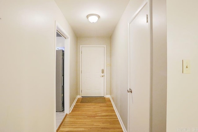 5 Brookridge Dr, Little Rock, AR 72205 - hallway with light wood finished floors and baseboards