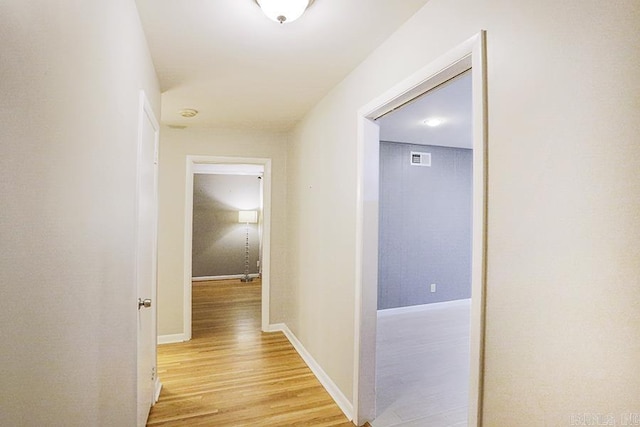 5 Brookridge Dr, Little Rock, AR 72205 - hallway featuring light wood-style flooring and baseboards
