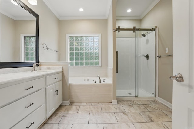 5017 Calico Creek Cv, North Little Rock, AR 72116 - bathroom with a bath, vanity, a shower stall, ornamental molding, and recessed lighting