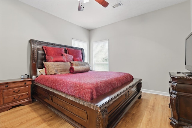 5017 Calico Creek Cv, North Little Rock, AR 72116 - bedroom featuring light wood-type flooring, baseboards, and ceiling fan
