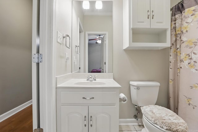 5017 Calico Creek Cv, North Little Rock, AR 72116 - full bath featuring vanity, toilet, baseboards, and ceiling fan
