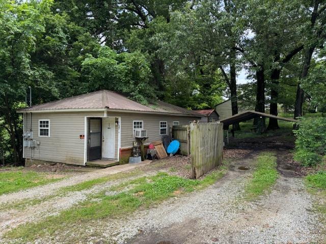 1301A Imboden St, Pocahontas, AR 72455 - view of front of home featuring driveway, metal roof, and cooling unit