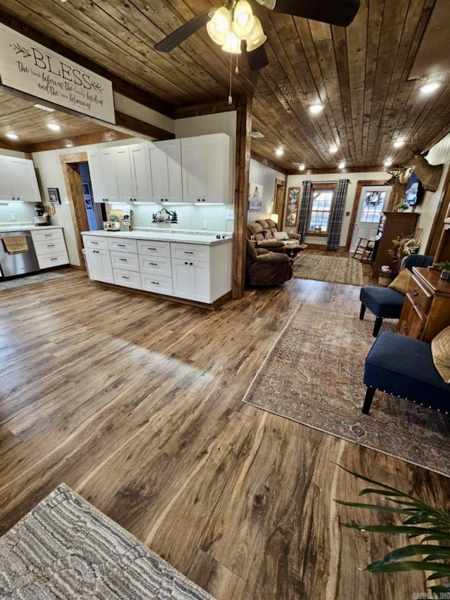 5867 County Road 4160, Ozark, AR 72949 - living room featuring wood ceiling, wood finished floors, and a ceiling fan