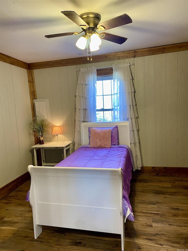 5867 County Road 4160, Ozark, AR 72949 - bedroom with wood finished floors, wooden walls, and a ceiling fan