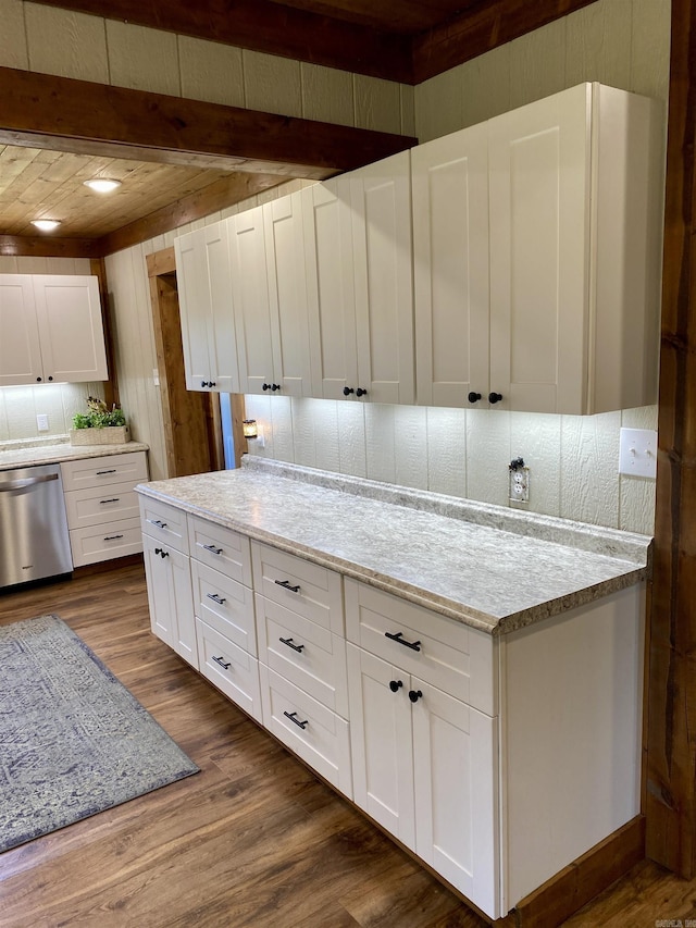 5867 County Road 4160, Ozark, AR 72949 - kitchen featuring dishwasher, dark wood-style floors, white cabinets, light stone countertops, and beam ceiling
