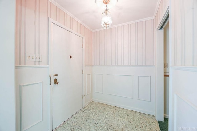 1706 W Block St, El Dorado, AR 71730 - doorway to outside with crown molding and a decorative wall