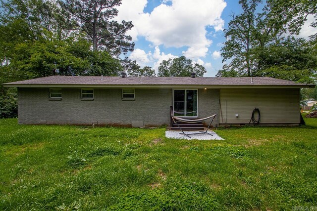 2302 E Meadowbrook, Bryant, AR 72022 - back of house with brick siding and a yard